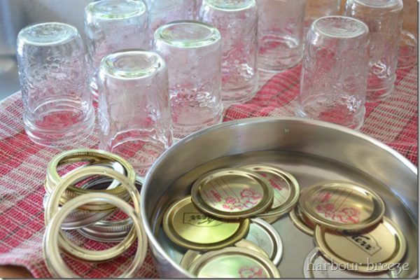 canning jars and lids on a counter