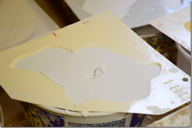 hardened plaster of paris in a mould ready to be removed