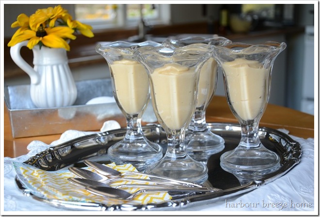Homemade vanilla pudding in parfait serving dishes.