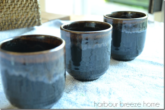 Dark brown glazed pottery mugs from thrift store.