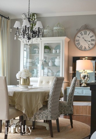 a Dining room painted in a light gray blue color