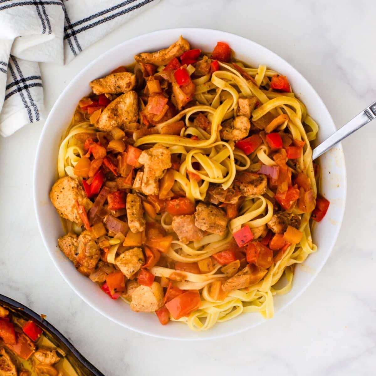 cajun chicken pasta in a serving bowl