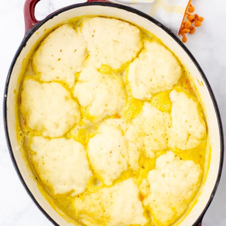 drop dumpling recipe on the top of a pot of potato soup
