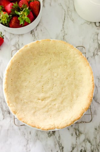 baked pie crust on a cooling rack
