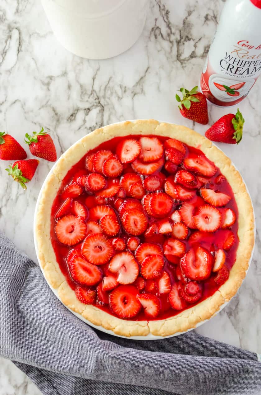 Strawberry pie with strawberry pie filling in a pie pan