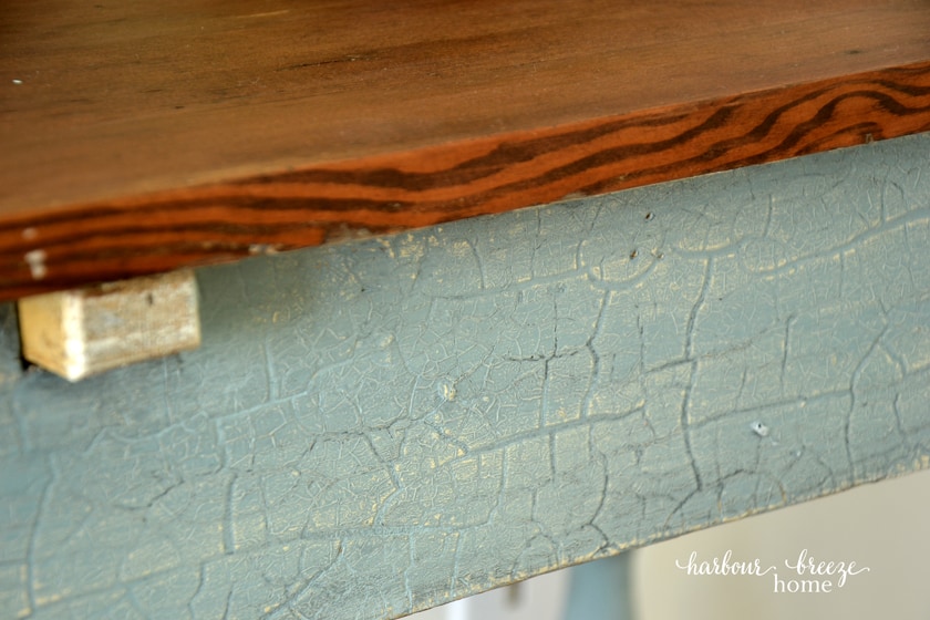 close up of desk with country chic elegance paint color and dark stained wood top