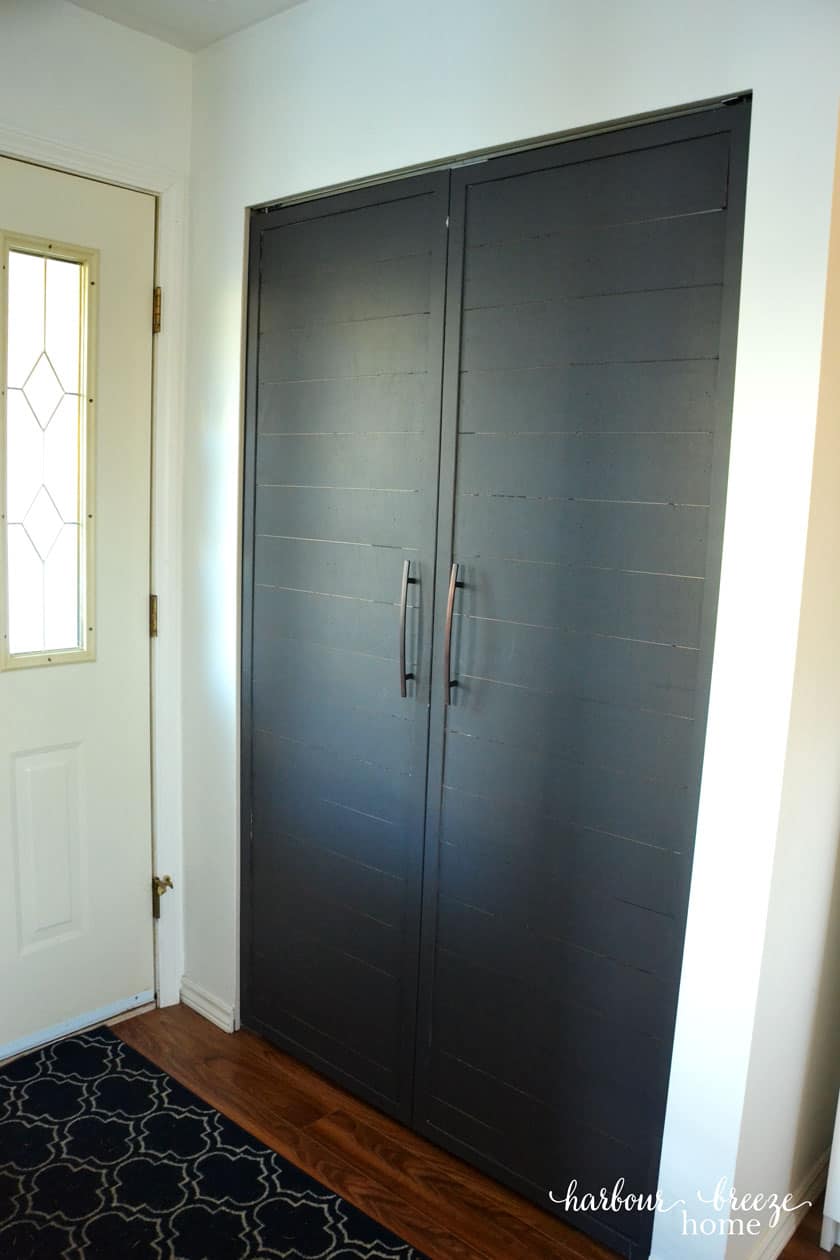 the entryway closet of a townhouse living room