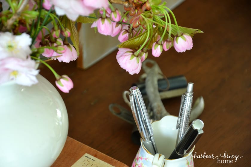 pink flowers on the corner of a desk