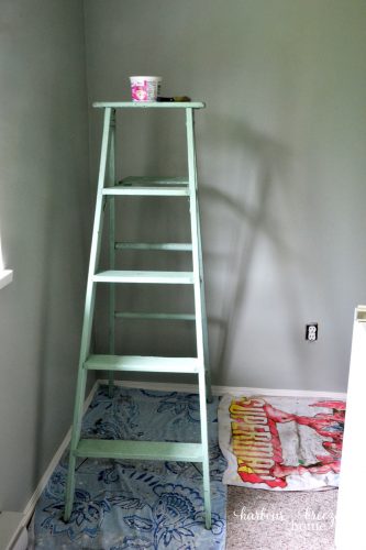 small cottage cheese container sitting on a ladder