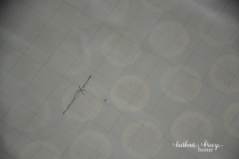 an "x" marked on a paper