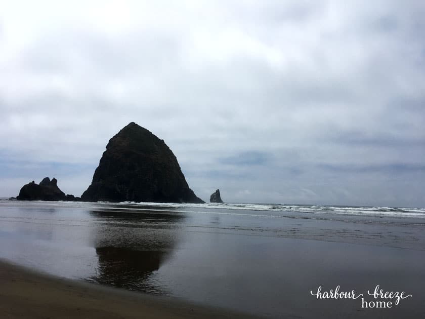 the ocean with a big rock in it ~ Haystack Rock in Canon Beach