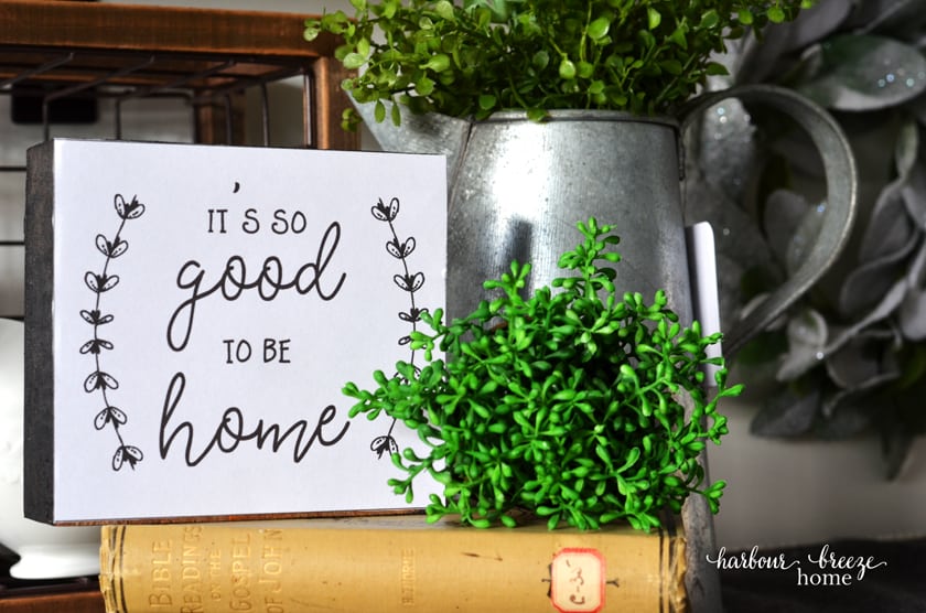 Finished DIY farmhouse sign made with free farmhouse printables and a 2 x 6 wood block.