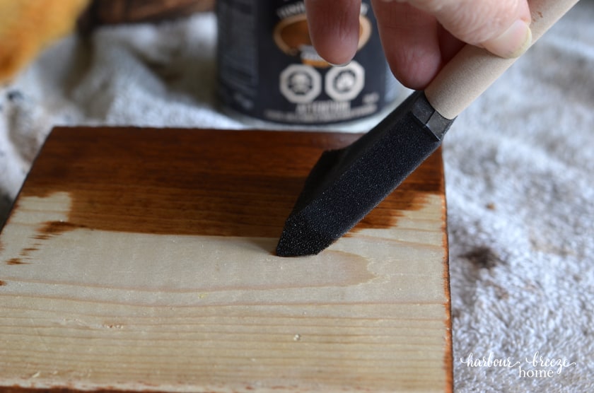 Wipe stain on the wood block to seal the grain of the wood.