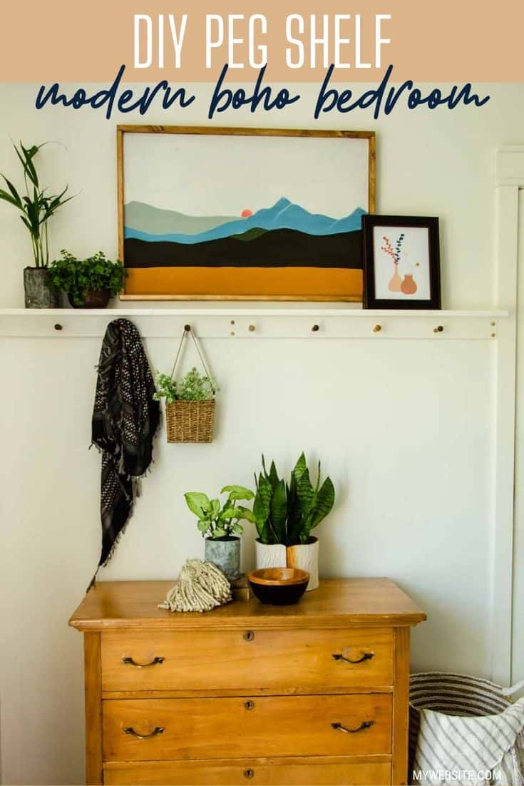 A boho shelf with pegs on a bedroom wall styled with boho style decor and plants