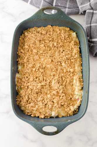 This old fashioned rhubarb cake recipe after the batter is spread in a pan and the topping sprinkled on - ready to go in the oven.