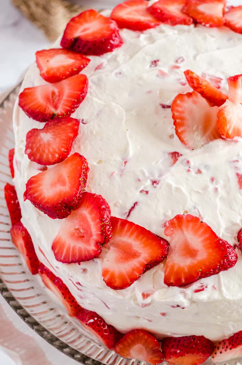 Top of Vanilla cake with Fresh strawberry icing and fresh strawberries