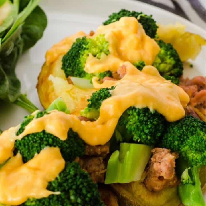 Loaded Baked Potato with Sausage & Cheese Sauce