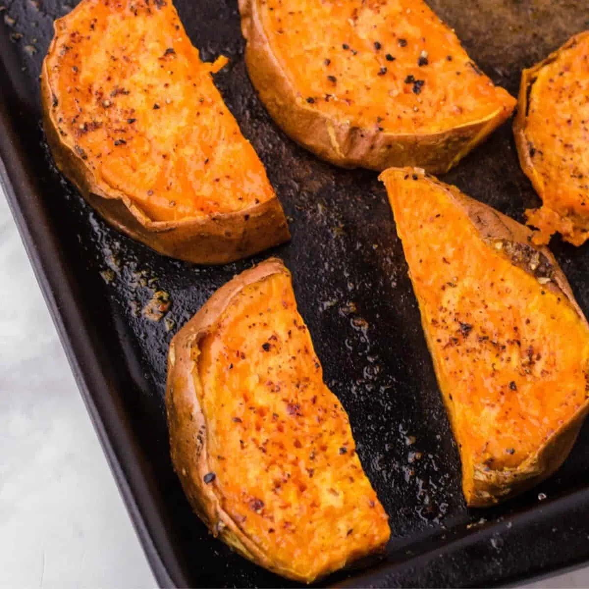 Roast sweet potatoes on a pan