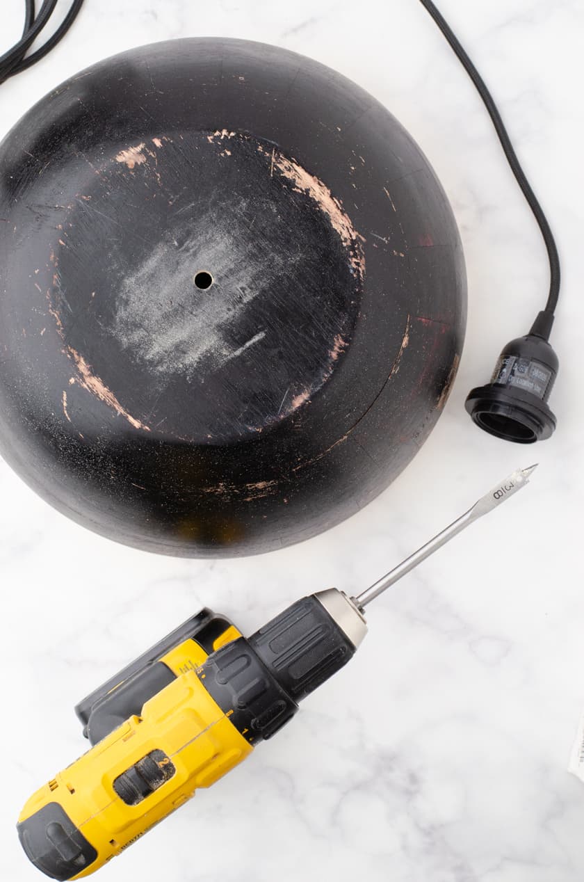 Drill hole in the bottom of the wooden bowl
