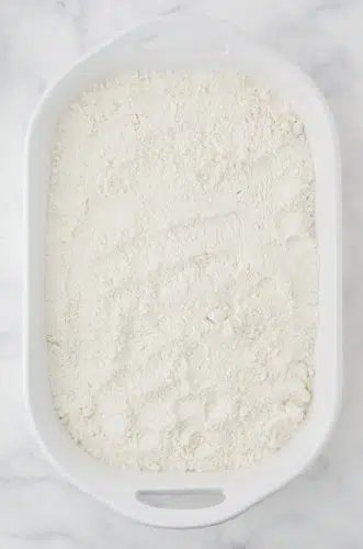 cake mix sprinkled onto cherry pie filling for cherry dump cake recipe