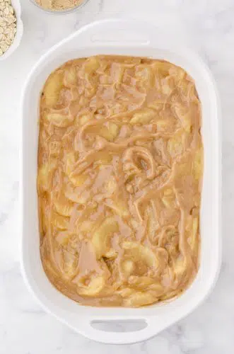 the apple pie filling base for apple crisp with pie filling in a 9x13 inch pan