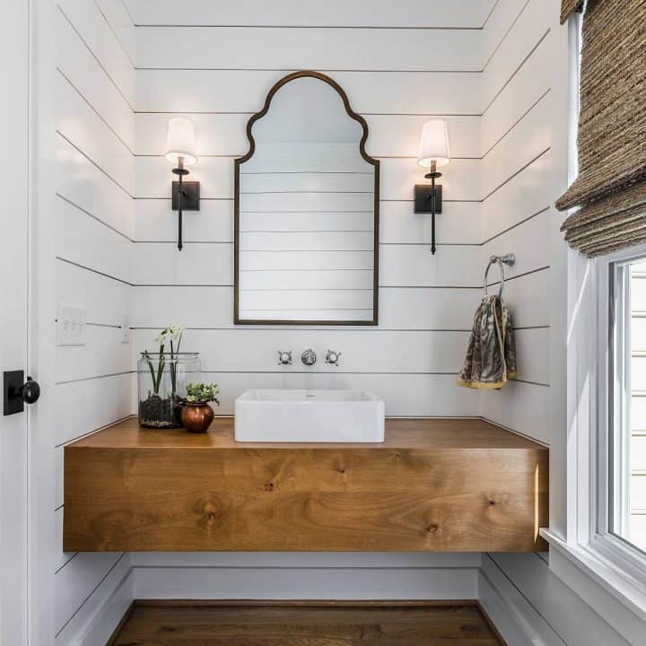 Image for Simple and elegant farmhouse style powder room makes smart use of space