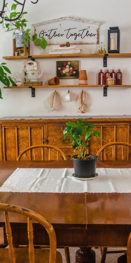 A Cottage Core Room - Dining room arranged with cottagecore style of vintage and rustic items with plants. 