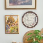 cottagecore art on a wall above a painted dresser
