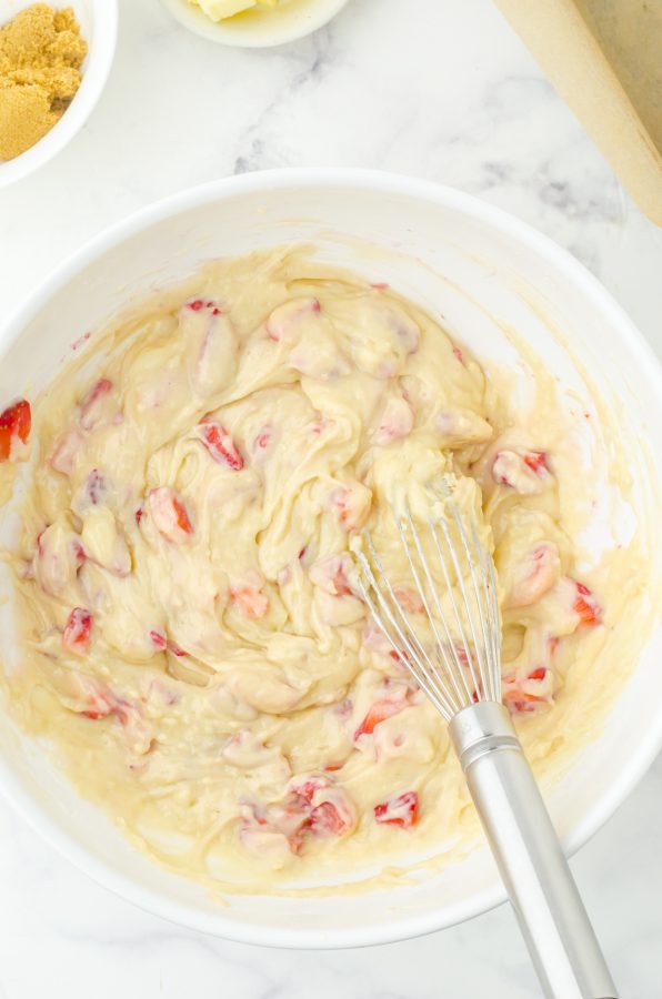 Strawberry bread batter all mixed together in a large bowl.