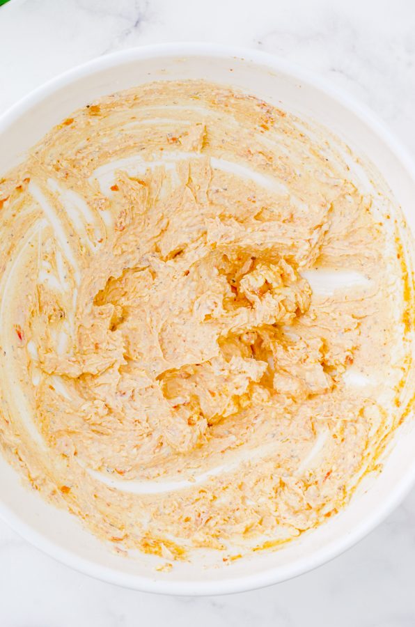 Sundried tomatoe sauce in a medium bowl after it has been mixed together.