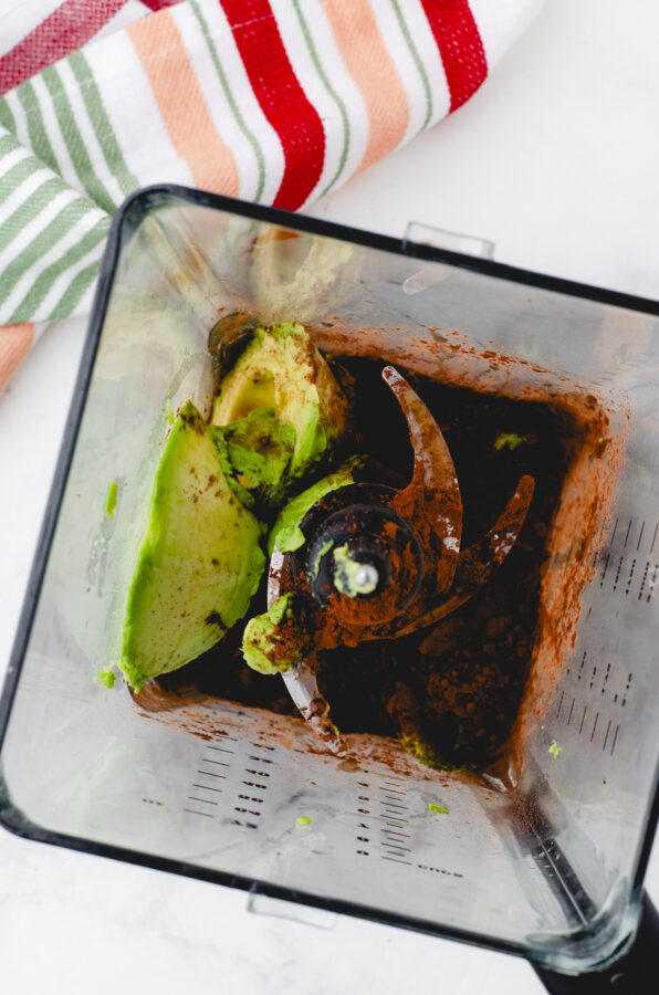chocolate avocado pudding ingredients in a blender ready to be mixed up