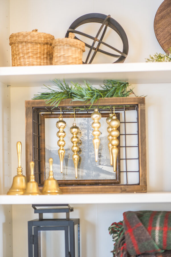 simple christmas decor in a bookshelf
