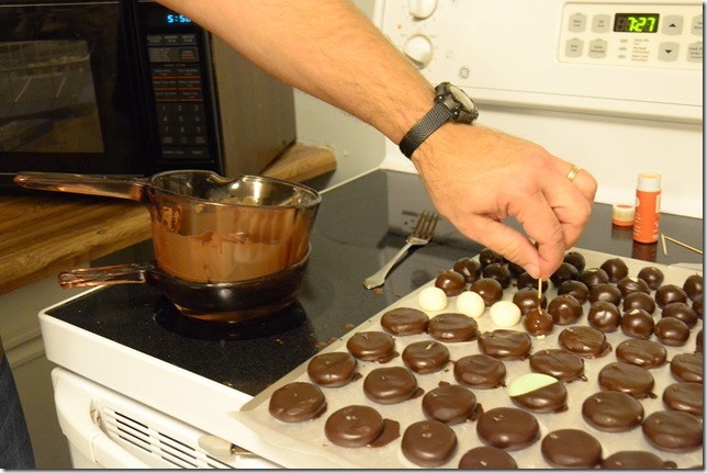 meltaway chocolates being dipped in chocolate