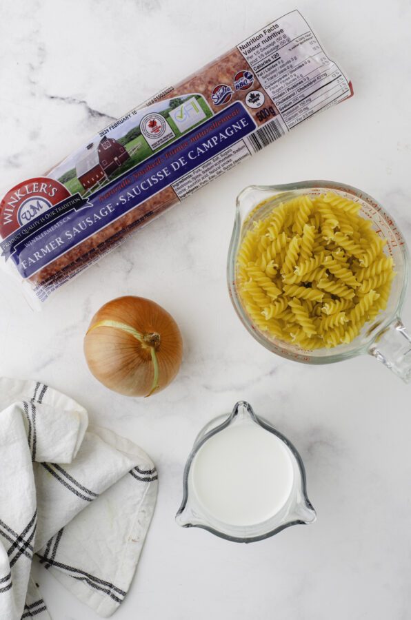 The ingredients needed for this farmer's sausage and noodles one skillet dinner