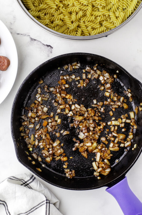 Sauted onions in a cast iron skillet.