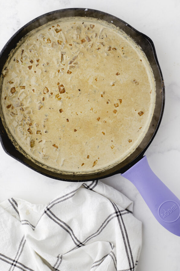 Cream added to diced onions to make mennonite cream gravy