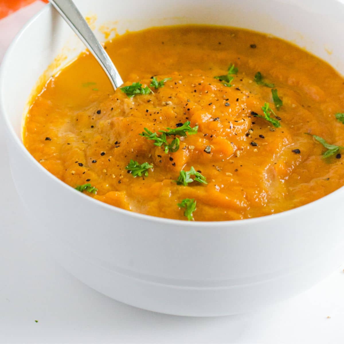 a bowl of creamy vegetable soup