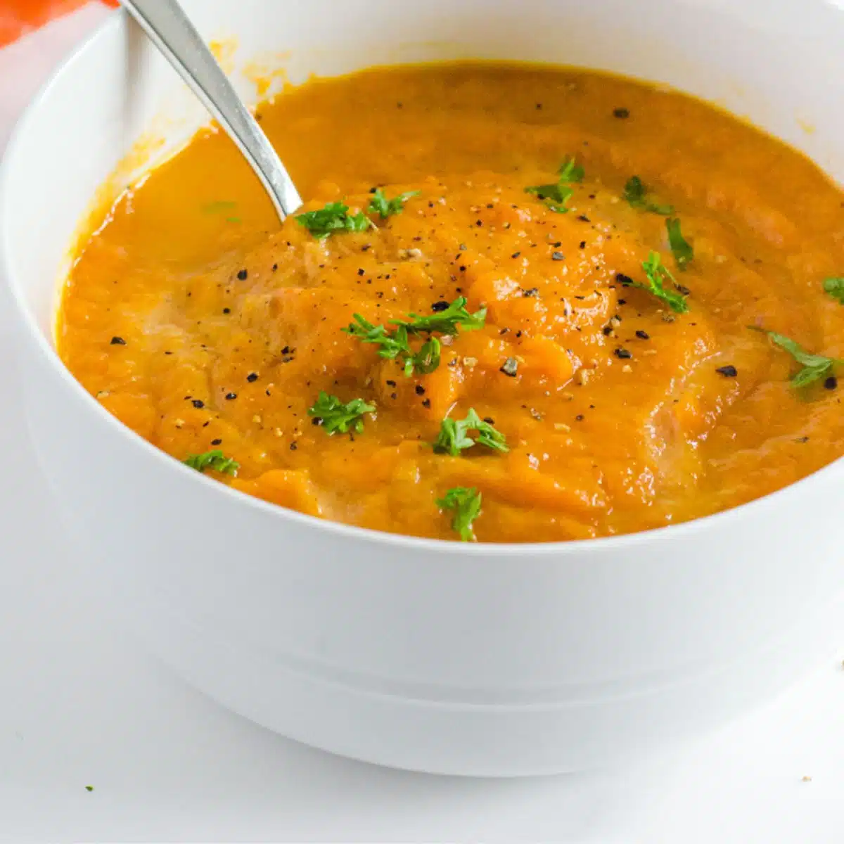 a bowl of creamy vegetable soup