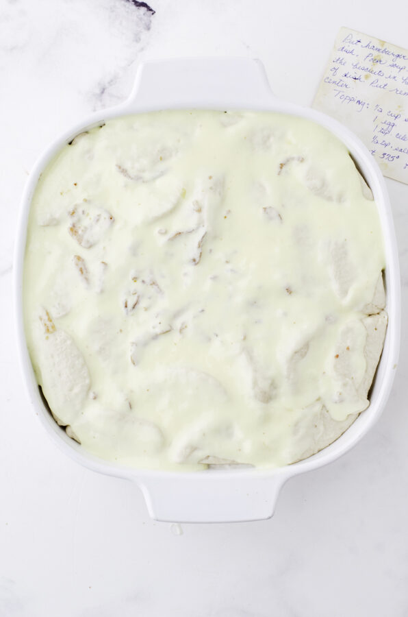 Stoganaff hamburger casserole with canned biscuits ready to put in the oven.