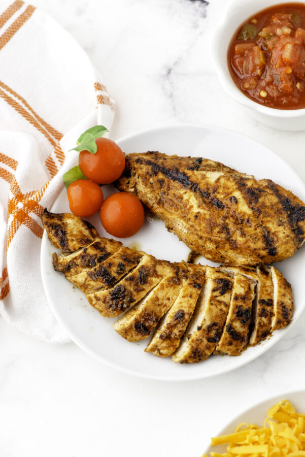 A plate of mexican chicken breast marinade after it has been grilled.