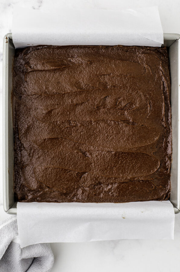 Sourdough chocolate brownies in the baking dish ready to be baked.