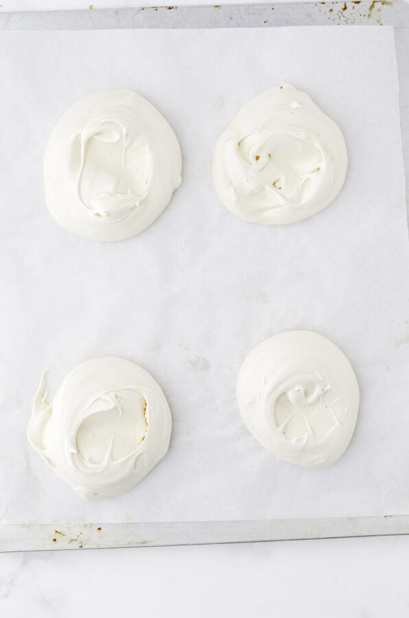 Once pavlovas are baked and completely cool, they are crispy on the outside and smooth and marshmallowy inside.