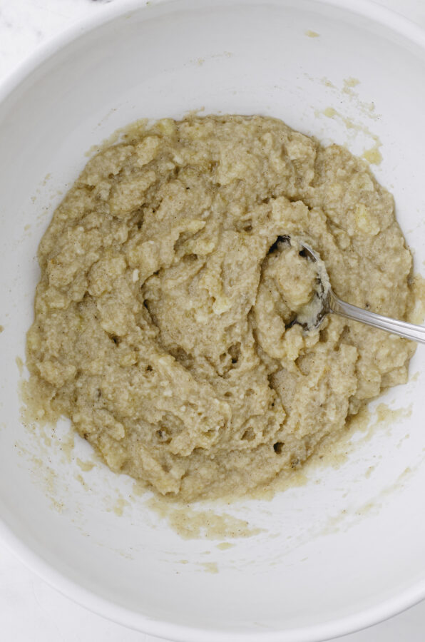 Banana bread cookie dough mixed together in a large bowl.