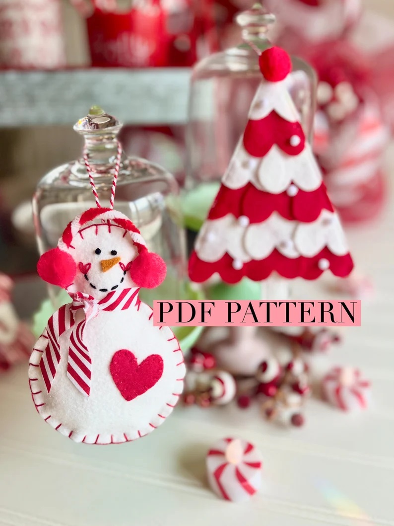 Felt snowman and christmas tree ornaments in the color red and white