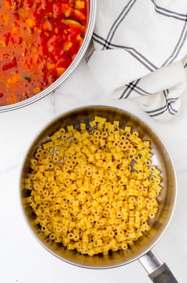 Cooked pasta drained and in a saucepan.