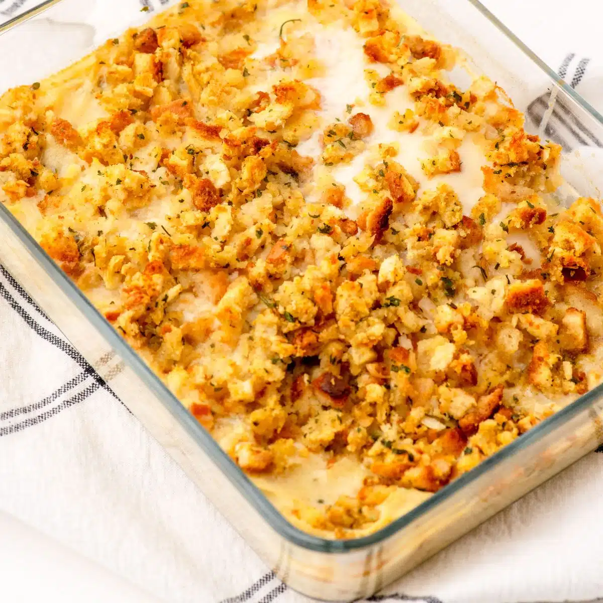 Baked Swiss chicken casserole with stuffing topping in a casserole dish