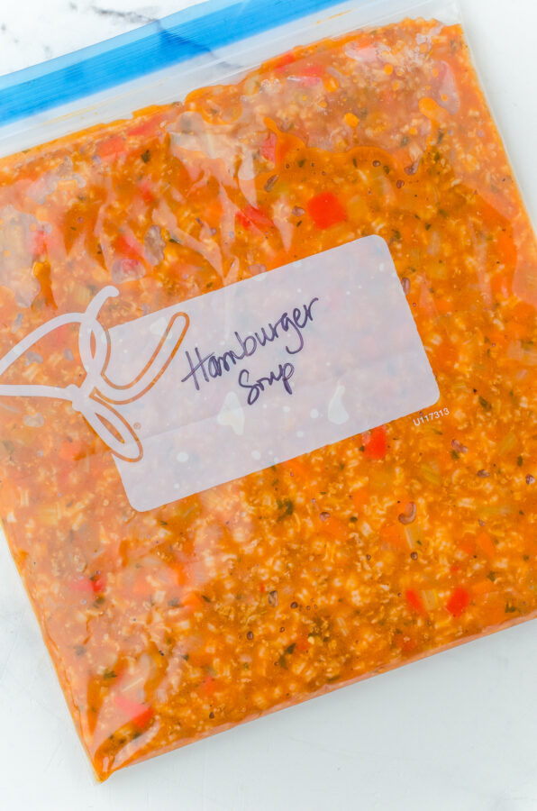 Hamburger Rice Soup in a ziptop freezer bag ready to be frozen.