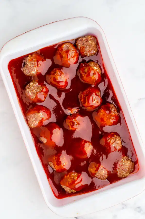 homemade barbecue meatballs sauce poured over meatballs