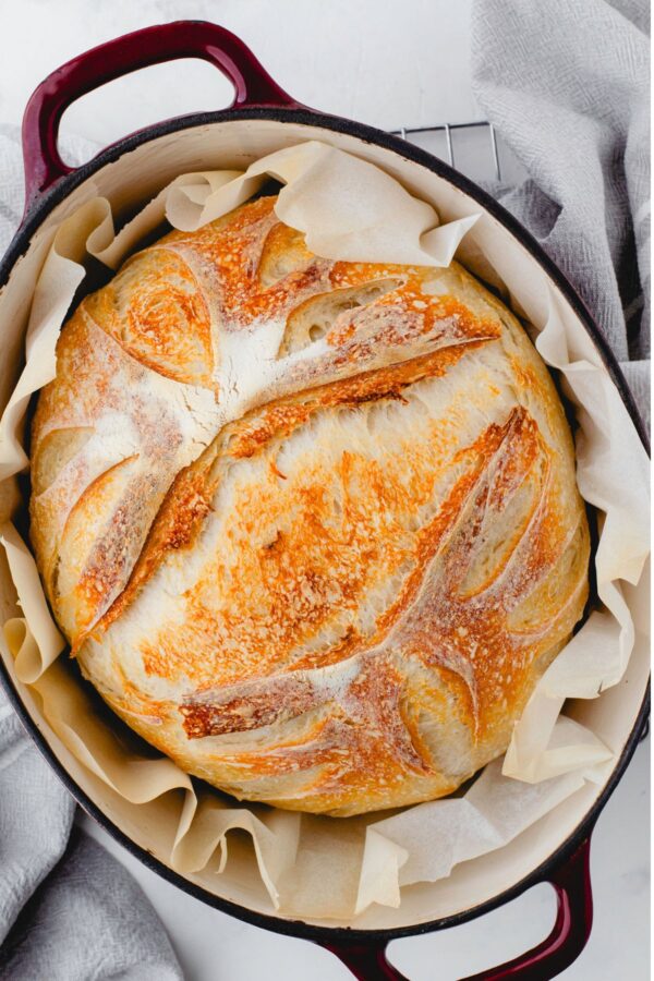 Sourdough bread freshly baked and in a dutch oven
