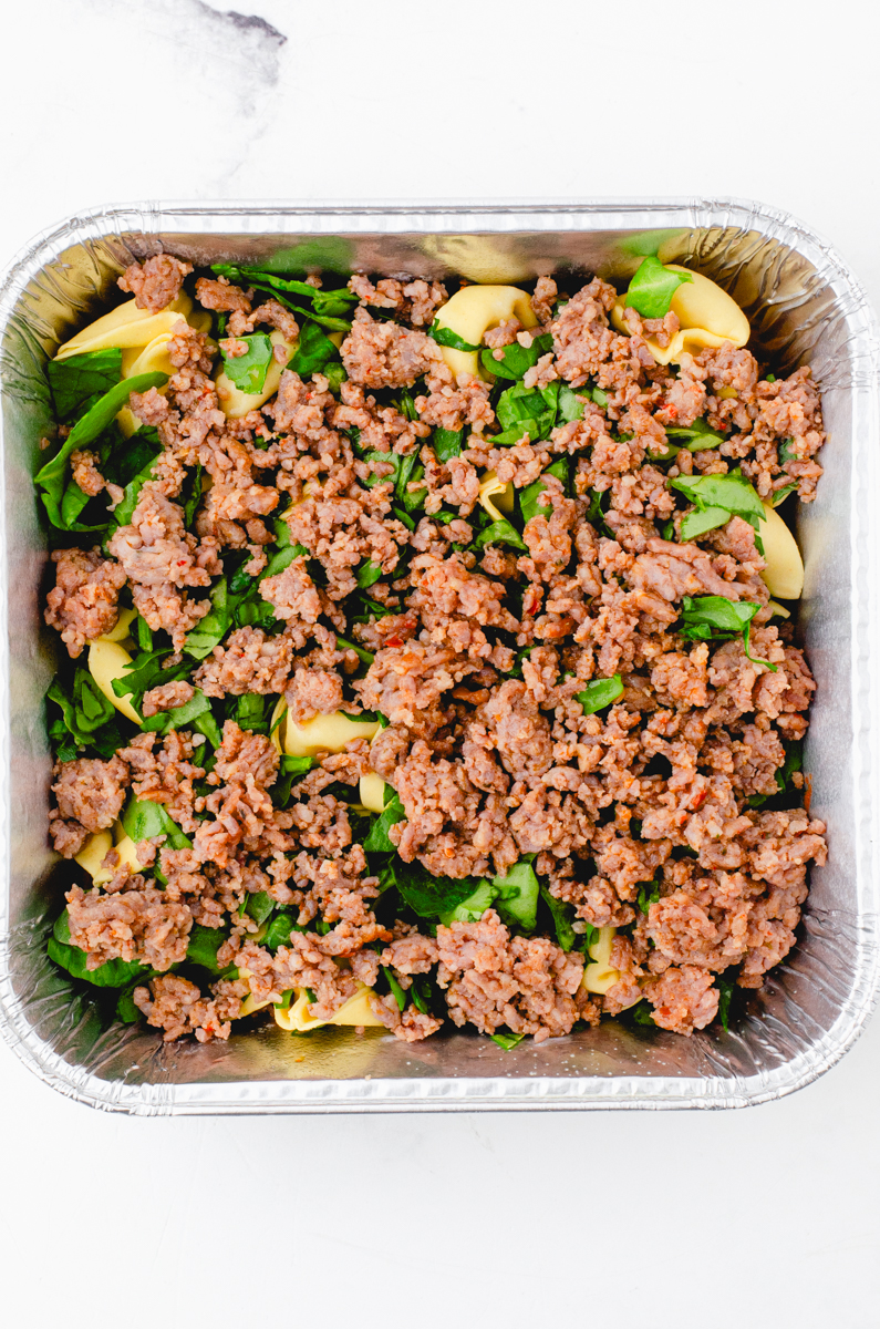 Cooked sausage layer in tortellini casserole